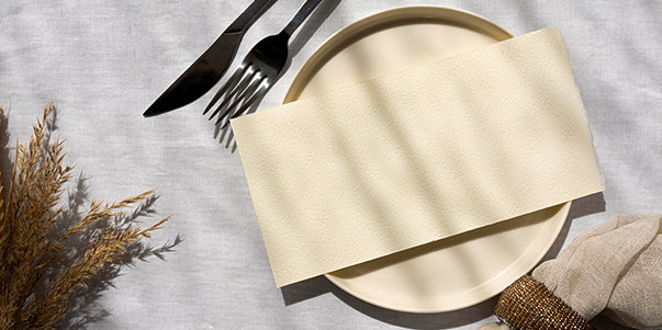 Use napkin for implementing table manners on fine dining